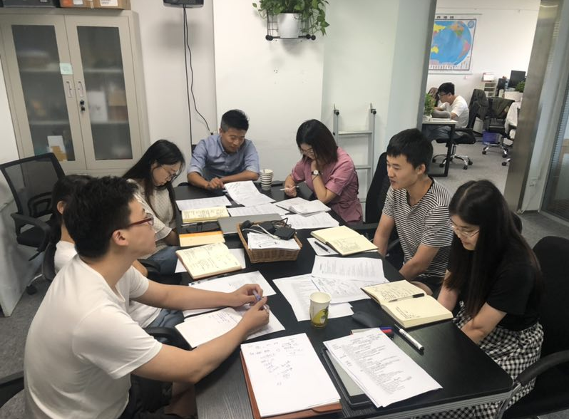 A Young and Energetic Team is Brainstorming A Young and Energetic Team is Brainstorming